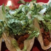 Pork Tacos · Served with lettuce, cilantro, onions and pico de gallo on the side.