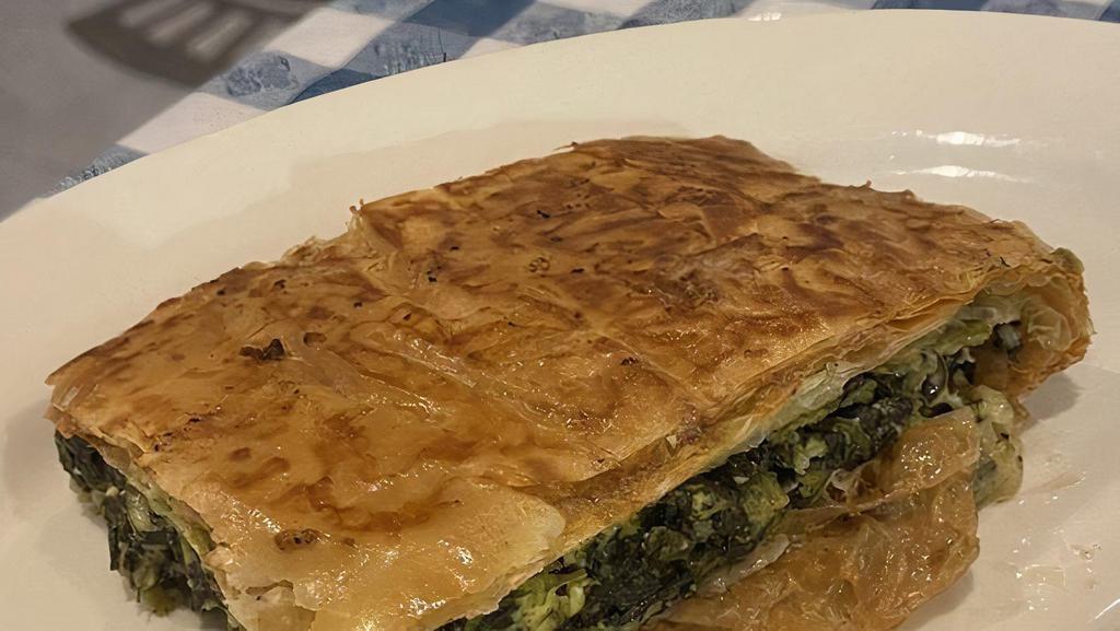 Spanakopita · Small. Spinach and feta cheese wrapped in phyllo dough.