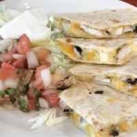 Quesadillas · Two flour tortillas stuffed with Monterey Jack and Cheddar cheese. Served with lettuce, pico...