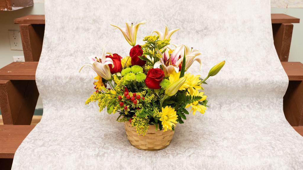 Bashful Basket · For the bashful quiet love, whom need appreciation with variety, this basket comes with Lililes, Roses, Carnations, Daisies, Salidago, Leatherleaf, Spidermouths, and Button Greens. (Basket Included)