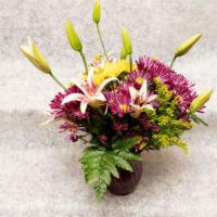 Violet Vixen · For the vivacious and vibrant special someone this bouquet comes with Lilies, Purple Daisies...