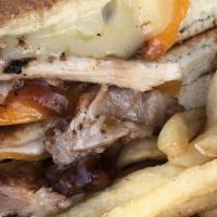 Pulled Pork Grilled Cheese · Smokey joker's pulled pork, pepper jack, provolone, American, cheddar, bbq sauce, pickles, T...