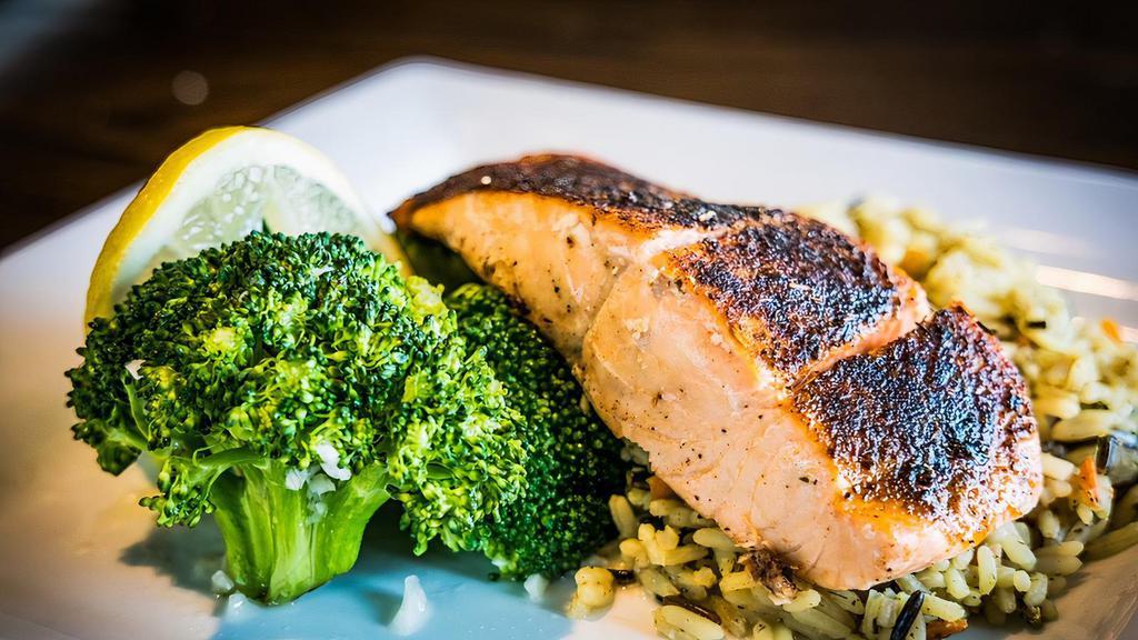 Blackened Salmon · Pan seared, seasoned long grain rice, broccoli.