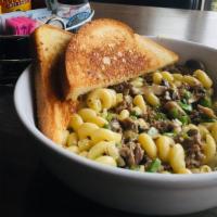 Philly Mac & Cheese · Our mac and cheese topped with Philly cheese steak, onions, mushrooms peppers.