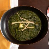 Saag Paneer · Fresh spinach cooked with cottage cheese, tempered with cumin, ginger and garlic.