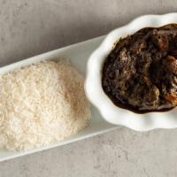 Cassava Leaf With Rice · Chopped cassava leaves cooked with smoked fish or turkey and beef in traditional african spi...