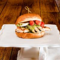 Chicken Melanzano · Grilled eggplant, roasted Roma tomatoes, and fresh Mozzarella over grilled chicken with basi...