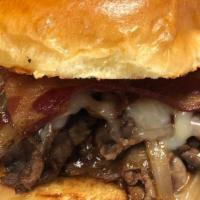 Pub Melt · Store roasted beef in balsamic brown gravy topped with bacon, caramelized onion, and Cheddar...