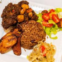 Oxtail Combo (Large) · Slow braised oxtail with carrots and butter beans. Served with steamed cabbage and rice and ...