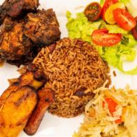 Jerk Chicken · Marinated Jamaican Jerk Chicken cooked to perfection. Served with any two sides.