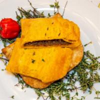 Beef Patty · A savory flaky pastry filled with spicy ground beef.
