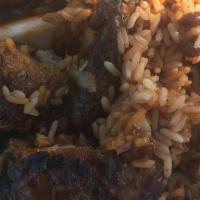 Rice And Peas · Long grain white rice and red kidney beans cooked with thyme, scallions, scotch bonnet peppe...