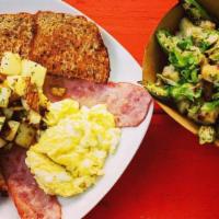 Spates Plate · Two soft scrambled cage free eggs, turkey bacon, and cilantro.
