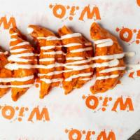 Buffalo Chicken Dumplings · Tossed in our Mild Buffalo sauce then drizzled with Buttermilk Ranch