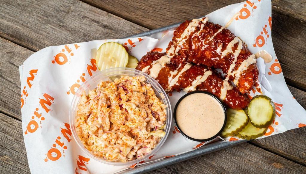 Nashville Hot Tenders Slaw/Corn Meal · 2 large crispy Nashville Hot-style chicken tenders served w/ pickle chips, chipotle ranch and your choice of fries, street corn or slaw.