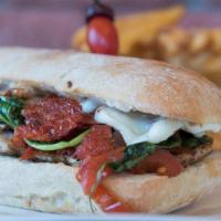Rustic Santorini · Grilled chicken with fresh spinach, shiitake mushrooms, sun-dried tomatoes and fresh mozzare...