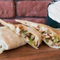 Chicken Quesadillas · Over sized filled with chicken breast, green peppers, onions and our high quality cheeses. S...