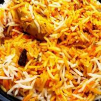 Chicken Biryani · Super basmati rice and chicken with special spices.