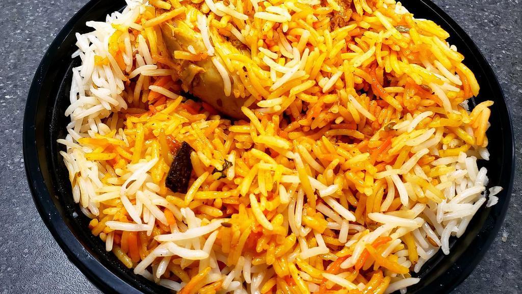 Chicken Biryani · Super basmati rice and chicken with special spices.