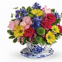 Dutch Garden Teacup · This bouquet features hot pink mini roses, yellow daisies, green Pompom, pink alstro, wax, b...