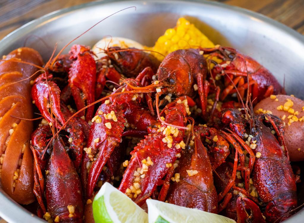 Boiled Crawfish (Live) · Live crawfish cooked with traditional or garlic butter seasoning.  Choice of mild,  medium, or extra hot. Served with corn & potato. $10.99/lb - 2lb Min.