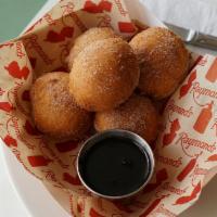 Warm Ricotta Donuts · Six home made donuts, dusted with cinnamon sugar. Side of wild berry jam and chocolate sauce.