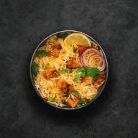 Yum Chicken Biryani · Long grain basmati rice cooked with tender chicken and aromatic Indian herbs. Served with ra...