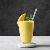 Mango Yogurt Lassi · Sweetened Indian drink made with freshly churned yogurt flavored with mango pulp.