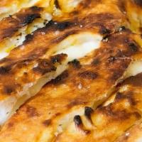 Truffle Cheese Bread · A house favorite for sharing, Baked in the wood fired oven with Fior di Latte  and Fontina c...