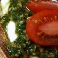 Bruschetta · Four Sourdough Crostinis baked with fresh Mozzarella (Fior di Latte), Grape Tomato, and our ...