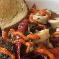 Sauteed Calamari · A true house specialty sauteed with green onion, mushrooms, garlic, tomato, calabrian chiles...