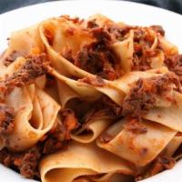 Ragu Bolognese · Our signature pasta served on pappardelle pasta with a hearty meat sauce made with braised s...