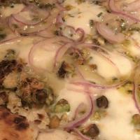 Pistachio · A White based pizza with Fontina, Spanish & Caramelized Onions, Pistachios, and Rosemary