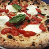 Filetti · White pizza with Fior di Latte, slow roasted cherry tomato confit and fresh basil with extra...
