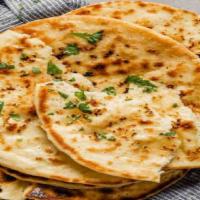 Garlic Naan · *POPULAR CHOICE* Fine white bread, smeared with cilantro and garlic paste!