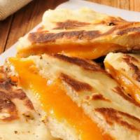 Cheese Naan · Fine white bread, stuffed with minced capsicum and cheese!