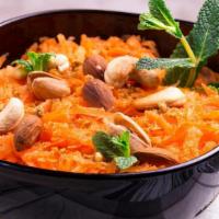 Carrot Halwa · Grated carrots. Submerged in milk. Indulged in sugar. Perfected in butter.