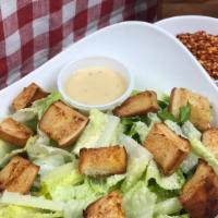 Caesar Salad · Crispy Romaine Lettuce, Parmesan Cheese, Croutons, and Caesar Dressing