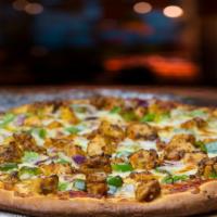 Dhoom Tandoori Chicken · Spicy Sauce,Red onions, Green peppers, Mozzarella cheese, and Spicy marinated tandoori chicken
