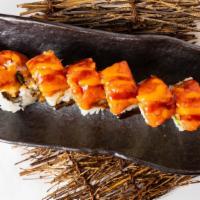 Ku Roll · Shrimp tempura, avocado, and crab meat topped with spicy tuna, mayo and eel sauce.