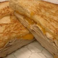 Turkey Melt · sliced turkey with two slices American cheese on thick cut white bread