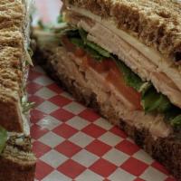 Turkey Pesto · Our oven roasted turkey, provolone cheese, lettuce, tomato, with pesto mayo served on marble...