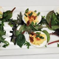 Stuffed Eggs (Deviled Eggs) · Classic stuffed eggs with chopped bacon, green onions, and fancy paprika.