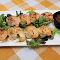 Grilled Shrimp · Skewer of 8 grilled shrimp served with choice of seasoning, lemon garlic, and butter or old ...