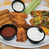 Pub Sampler Platter · Get some of our great pub favorites - 4 chicken wings - 3 potato skins, 4 mozzarella sticks....