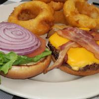 Single Bacon Cheeseburger · Classic cheeseburger,  four ounce patty,  American cheese, two slices of bacon, served with ...