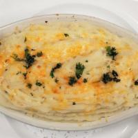 Shepherd'S Pie · Ground lamb, carrots, peas, onions in a rich  gravy, and topped with mashed potatoes.   Add ...