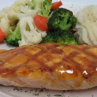 Jameson'S Whiskey Salmon · Grilled salmon with an Irish whiskey glaze served with sauteed vegetables and mashed potatoes.