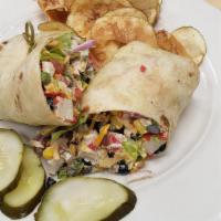 Southwest Chicken Wrap · Grilled chicken, crispy tortilla strips, avocado, lettuce, cherry tomatoes, red onion, shred...