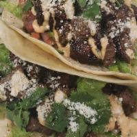 Tres Tacos · Flour tortillas, choose chicken, pork, or steak. Taco's come with fresh pico de gallo and fr...
